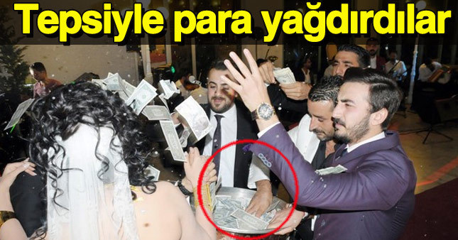 Aşiret düğününde tepsilerle para yağmuru