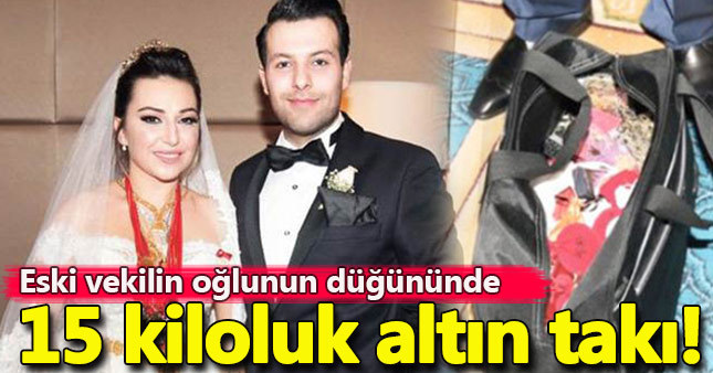 Düğünde takılan 15 kilo altın valize zor sığdı