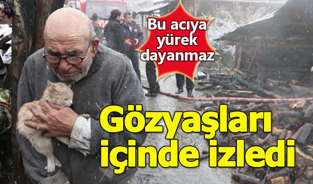 Evinin yanışını gözyaşlarıyla izledi