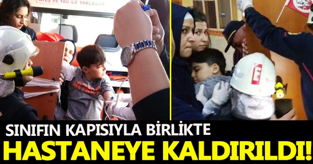 Sınıfın kapısıyla hastaneye kaldırıldı!