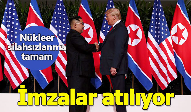 Tarihi zirve Singapur'da başladı imzalar atılıyor