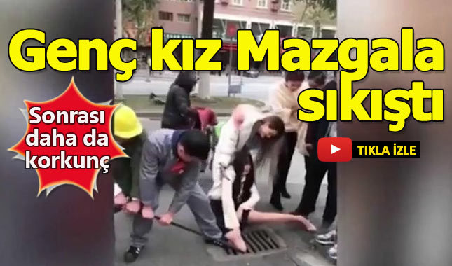 Telefona dalıp bacağını mazgala sıkıştırmayı başaran kadın!