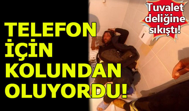 Tuvalet deliğine düşen telefonun almak istedi, kolundan oluyordu!