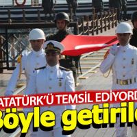 Atatürk'ü temsil eden bayrak karaya çıkarıldı