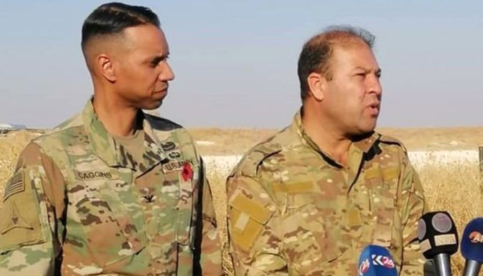 ABD'li komutan ile YPG'li terörist aynı karede