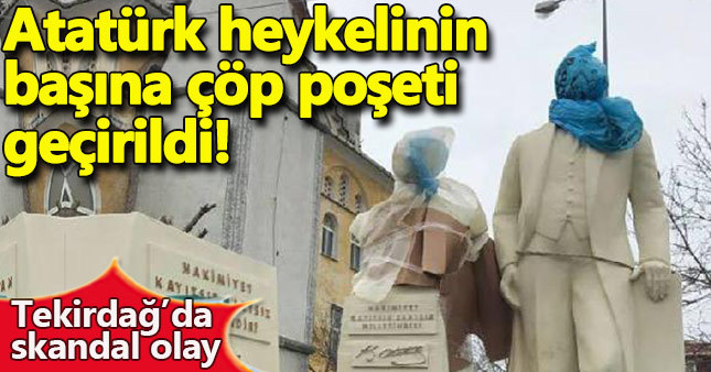 Atatürk heykelinin başına çöp poşeti sarıp taşıdılar