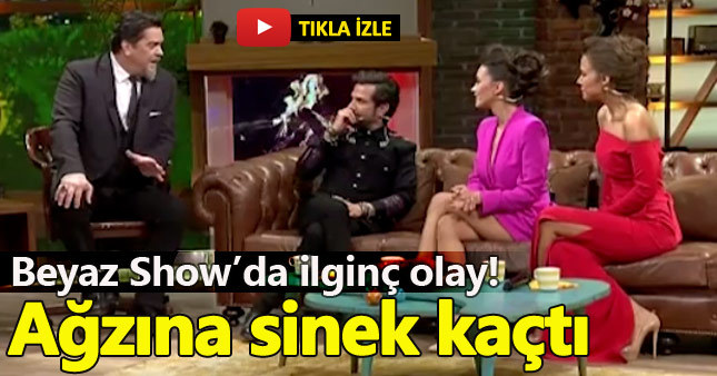 Beyaz Show'da Kenan Doğulu'nun ağzına sinek kaçtı