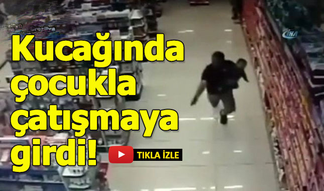 Kucağında çocuk ile silahlı çatışmaya girdi!