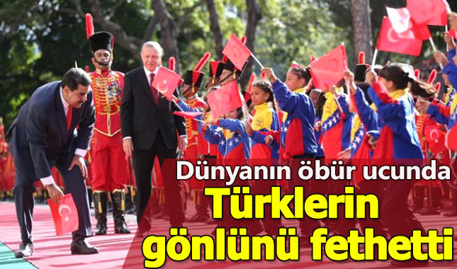 Maduro'dan yere düşen Türk bayrağını eğilip aldı