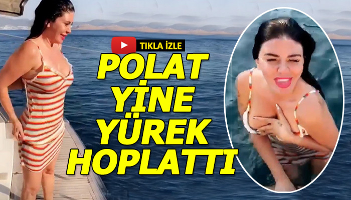 Şarkıcı Ebru Polat'ın denize elbise ile girmesi