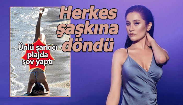 Şarkıcı Elif Kaya'nın sahilde bikinisiyle akrobatik şov yapması