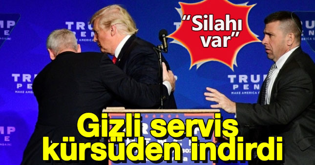 Trump gizli servis tarafından kürsüden indirildi