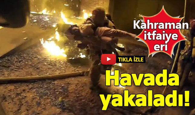 Yangın merdiveninden atılan çocuğu havada yakalayan İtfaiye eri