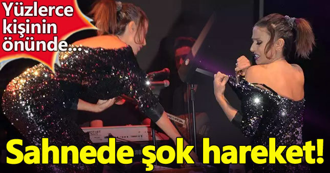 Yıldız Tilbe konserde elbisesini kesti